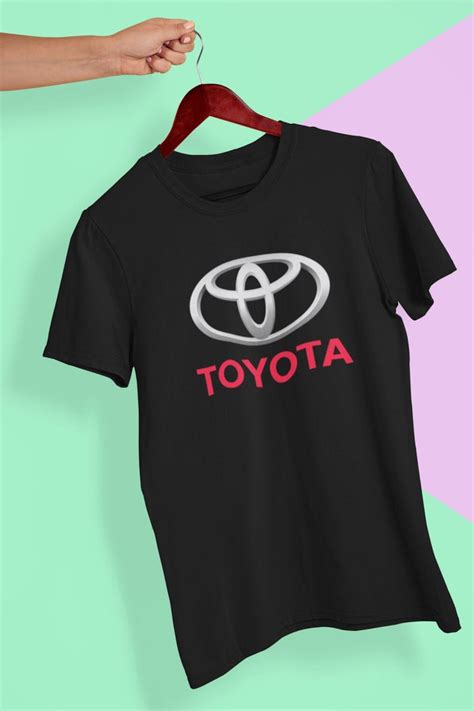 Check out our vintage toyota clothing selection for the very best in unique or custom, handmade pieces from our shops.