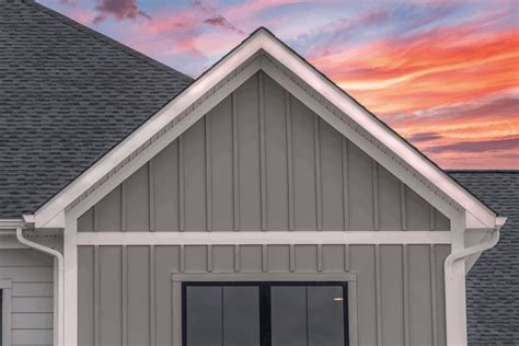 Vinyl board and batten. Board and batten siding mixes wide and narrow planks. The thinner ones (battens) hide the joints between the bigger planks (boards). It’s sometimes called barn siding because it was so common in farmhouse barns. So let’s look at some top board and batten vinyl siding ideas. 1. Simply Grey 
