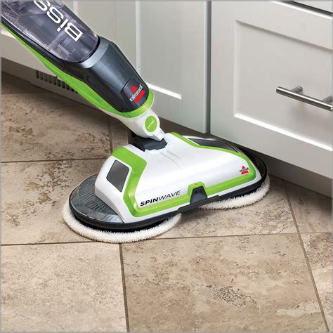Vinyl floor cleaning. Keep foot traffic to a minimum (recommended). Sweep the floor to remove loose dirt. Use only a non-abrasive cleaner, such as Shaw Floors Hard Surface Cleaner. Do not use a vacuum with a rotating beater bar. Wait 24 hours before putting furniture on the floor (for glue down products). Following these instructions will ensure proper curing of the ... 