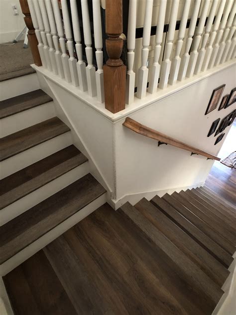 Vinyl plank stairs. Feb 1, 2021 · We did this by notching out the under side of the plank to allow for a bend and then adhering it to the step itself. We first counted how many pieces of stair nosing we would need. Then measured how long we needed the nosing piece to hang down. We did 2 1/4 inches. We then ran the pieces of flooring through the table saw. 