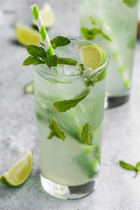 Virgin mojito. Try to extract as much of the liquid as possible. 5. Clap mint leaves together in your hands to release the oils and scent, then add them to your glass. Add ice and top with half ginger ale and half soda water. Stir gently. 6. Garnish with your choice of mint, cucumber, lime or extra ginger and serve. 