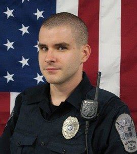 Virginia officer fatally shot during struggle with assault suspect in woods