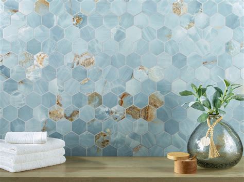 Maximo | Vita Bella Hexagon Porcelain Mosaic Tile, 10 x 11, Blue, 6.5 mm Thick - Floor & Decor. Product details. Liven up any room with the Vita Bella Hexagon Porcelain Mosaic. This 10 x 11 tile features a matte finish. Durable stone-look tile is an affordable alternative to natural stone, and it looks great throughout the house.. 