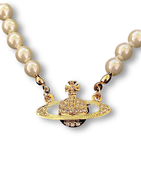Vivienne westwood chain. Simonetta bas relief pendant. $215. 28 / 71 Items Viewed. Load 28 more. Discover the new collection of women's designer necklaces by Vivienne Westwood. Find iconic chokers, three row pearl necklaces, orb pendants on delicate chains and more. 