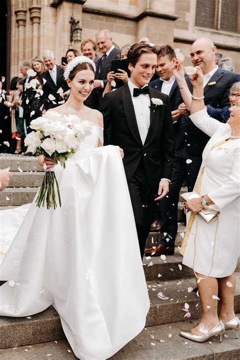 Vogue weddings. Carolina Herrera tulle fit & flare midi-dress. $5,990. SAKS FIFTH AVENUE. Gucci floral brocade handbag. $4,700. GUCCI. From the more-is-more maximalist attitude to cool bridal separates and bold ... 