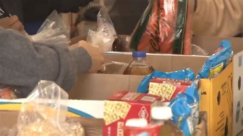 Volunteers crowd Shirley’s Pantry in Mattapan to prepare hundreds of Thanksgiving meals