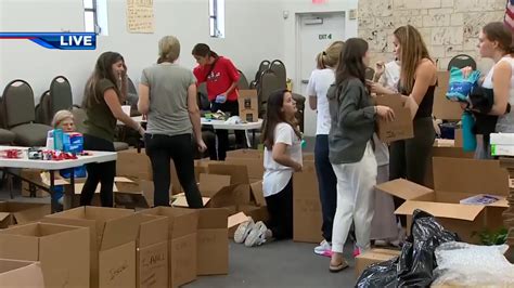 Volunteers pack up supplies at Skylake Synagogue in North Miami Beach as war in Israel continues
