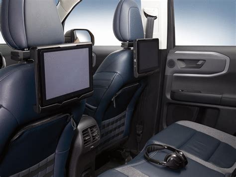 Why Buy: Entertain your rear seat passengers with this dual tablet-style system that can be used for movies and games! Allows for in-vehicle charging or can be used outside if desired. Details:Tablet-style entertainment system features two Andriod tablets that can be used to show the same movie/game or can be used inde