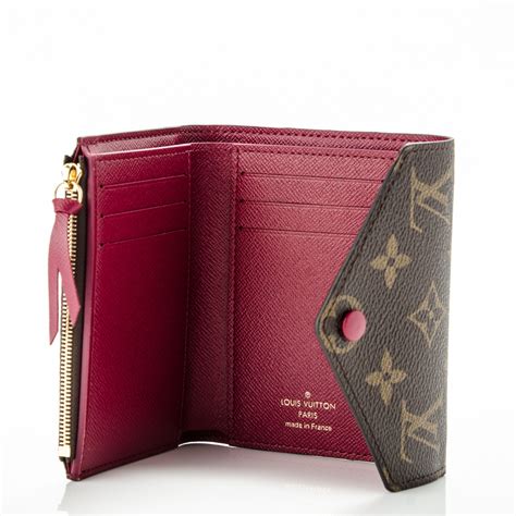 The Victorine Wallet in Monogram Reverse Canvas is a chic and practical accessory that showcases the Louis Vuitton signature. It features a contrasting flap that opens to reveal a spacious interior with multiple slots and compartments for cards, bills, and coins. This wallet is a perfect choice for anyone who loves the classic Monogram canvas with a twist.. Vuitton victorine wallet