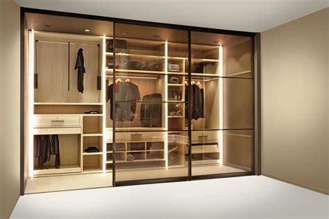 Walk-in wardrobe with sliding door - All architecture and … - balustradellc