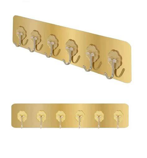 Wall Mounted Golden Steel Adhesive 6 Hook Rack - IndiaMART - raincitystudios.com