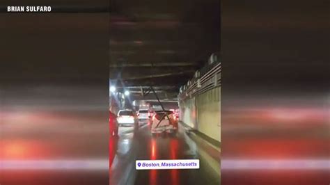 WATCH: Driver nearly hits tunnel ceiling while driving with basketball hoop on car in Boston