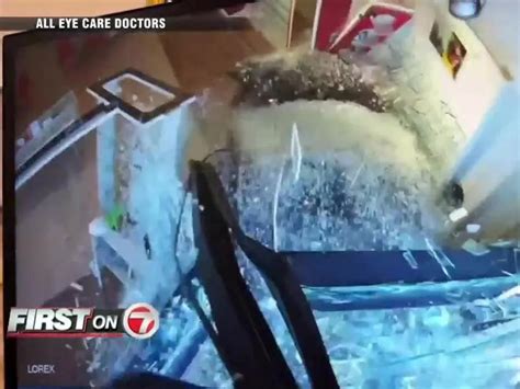 WATCH: No injuries reported after vehicle slams through storefront in Burlington