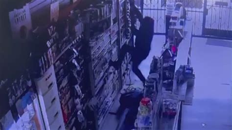 WATCH: Rope-climbing burglar steals lotto scratchers, cigarettes