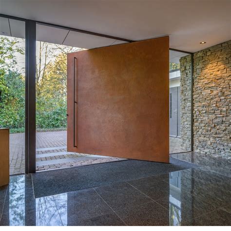 Why Pivot Doors Are the Ultimate Statement for Luxury Homes - balustradellc