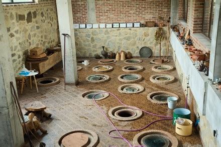 Wine cellar with traditional large earthenware vessels buried in the ... - balustradellc