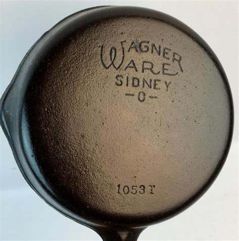 THIS IS A WAGNER WARE #3 AND ON THE BACK HAS WAGNER WARE SIDNEY 0 AND 1053 B. THIS IS IN VERY NICE CLEAN CONDITION. I CLEANED AND TREATED THIS PAN AND IS READY TO GO. THE PAN MEASURES 6 1/2 INCHES ROUND AND 1 1/2 INCHES DEEP. SHIPPING WILL BE $9.00 AND IF NEED INSURANCE AN EXTRA …. 