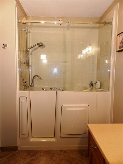 Walk in shower and tub combo. Feb 18, 2022 ... If you remove both your traditional bathtub and your shower stall, you can make room for a much larger walk-in tub and shower combo that will ... 