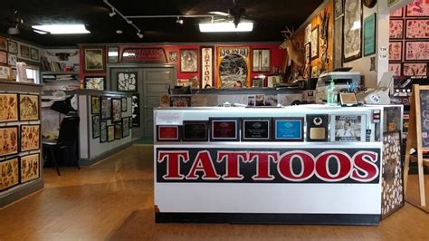 Walk in tatto near me. Alien & Co. Tattoos & Piercings, Sioux Falls, SD. The owner, Steve “Alien” Butterfield, has 33 years of experience and is the city’s most awarded tattoo artist. Tattoo services include nearly everything, like portraits, traditional, floral, script, and custom designs. Available piercings include traditional offers, many non-traditional ... 