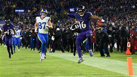 Walk-off Wallace: Ravens punt returner goes 76 yards for TD in OT in a 37-31 win over the Rams