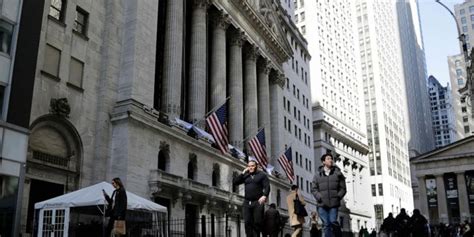 Wall Street futures flat as markets await more economic data