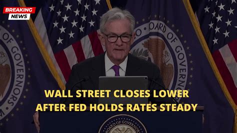 Wall Street holds steady ahead of Fed decision on rates
