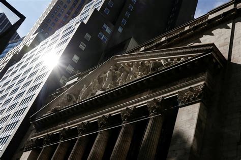 Wall Street opens a bit lower as worries about banks persist