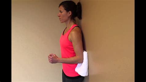 Wall climbing exercise for shoulder.  SHOULDER EXTENSION ISOMETRICS Stand with...
