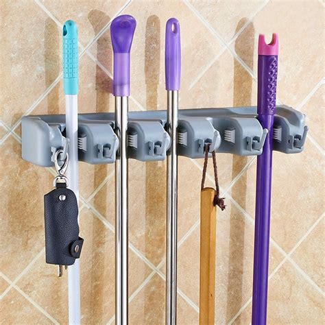 Wall mounted broom holder. Sumnacon Mop Broom Holder Organizer, 4 Pcs S-Type Wall Mounted Cleaning Tools Organizer, Space Saver Brooms Mops Rakes Holder, Stainless Steel Heavy Duty Broom Mop Handle Holder for Kitchen Garage QBOSO Wall Mounted Mop and Broom Holder Stainless Steel S Type Broom Rack Anti-Slip Mop Organizer (17 … 