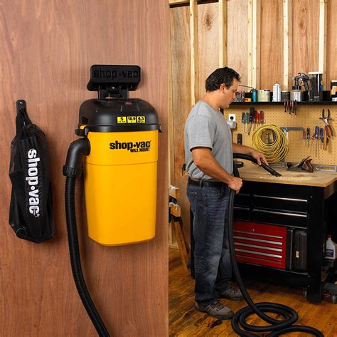 Wall mounted garage vacuum. Shop-Vac 5 Gallon 5.5 Peak HP Wet/Dry Vacuum, Wall Mountable Compact Shop Vacuum with 18' Extra Long Hose & Attachments, Ideal for Jobsite, Garage, Car & Workshop. 9522236 dummy InterVac Design GarageVac GH120-E Black Wall Mounted Garage Vacuum with Accessory 