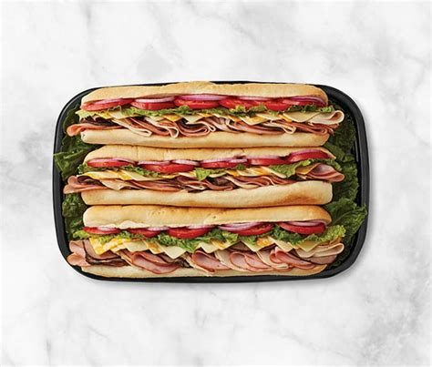 Walmart deli sub sandwiches. Check with your local Walmart Deli Department to speak with an associate for more details. Working together, we'll help make your special event a success. 2,000 calories a day is used for general nutrition advice, but calorie needs vary. Additional information available upon request. 2 ft. Sub Tray £ $18 $28 $3998 250–330 cal per sandwich 