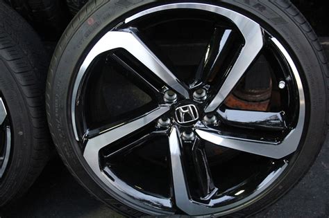 The current generation Accord is sold in multiple trims with several tire sizes: The LX, EX, and EX-L trims come with 17-inch wheels with tires size 225/50R17. The OEM tire is either the Pirelli P4 Four Seasons Plus or the Fuzion UHP Sport A/S. The Sport and Touring trims come with 19-inch wheels and tires size 235/40R19 96V XL.. 