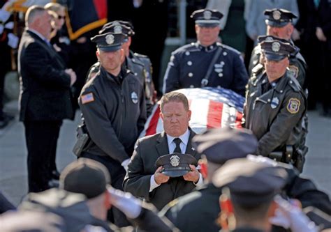 Waltham police officer Paul Tracey laid to rest: ‘This is the hardest thing we’ve ever had to do’