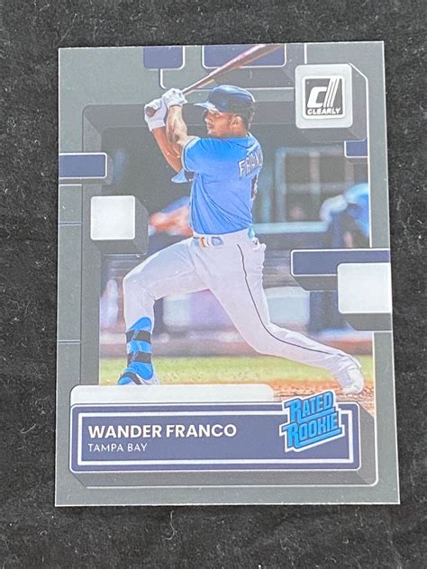 Wander franco donruss rated rookie. 2019 Panini Donruss Optic Rated Rookie #7 Wander Franco. The next option you have is the Panini Donruss Optic Rated Rookie card of Wander Franco. This is a great bargain in our opinion, at least for the time being. Even though this card is not as widely available as the other two rookie cards we've mentioned, it's still quite inexpensive ... 