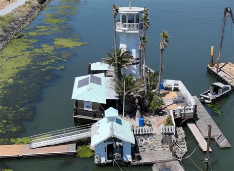 Want to stay on the Bay Area’s famed floating island with palm trees and lighthouse? Now you can.