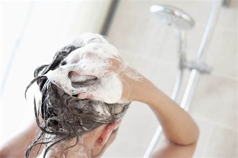 Wash hair. The correct amount of shampoo. Place a small amount into your hand – around a tablespoon should be fine – and work in the shampoo at the scalp. That way, you’ll remove grease and oil where it’s most concentrated. From there, massage the lather down your hair fibers. The outside of each hair is covered in cuticle scales, kind of like ... 