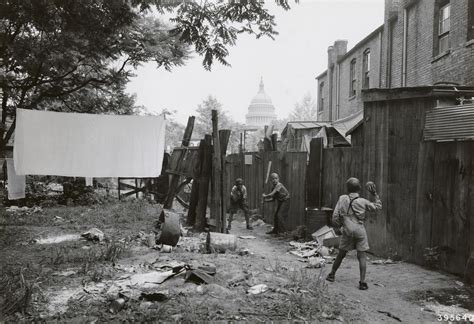 Washington dc slums. Slums near the Capitol, Washington, D.C. With the Capitol clearly in view, these houses exist under the most unsanitary conditions; outside privies, no inside water supply and overcrowded conditions - digital file from original neg. | Library of Congress Photo, Print, Drawing Slums near the Capitol, Washington, D.C. 
