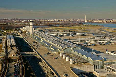 Washington reagan airport. Departure and walking through terminals 1 and 2 of the Ronald Reagan Airport (DCA) in the city of Washington DC, Showing the Airlines Counters, Gates, Check ... 