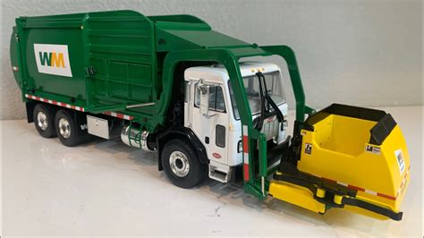 New First Gear Side Loader Waste Management Garbage Truck at work on Trash Day.subscribe here- https://www.youtube.com/channel/UCZXtL4Yrj1UpNhv6JNE3Ltw?sub_c.... 