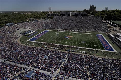 Watch ku football game today. The Kansas Jayhawks football program is the intercollegiate football program of the University of Kansas. The program is classified in the National Collegiate Athletic Association Division I Bowl Subdivision, and the team competes in the Big 12 Conference. The Jayhawks are led by head coach Lance Leipold. The program's first season was 1890 ... 