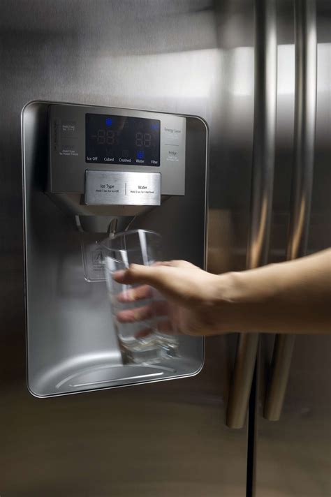 Water comes out of the door water dispenser as the ice maker …