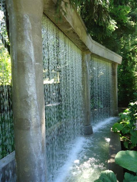 Water from wall. The AquaVeil® is a luxury bespoke water wall offered in three ‘Styles’. The Enigma ™, which is our standard and most popular design, creates the unique embossed water effect, made to your bespoke size. The Paradox ™ has all the benefits of the Enigma, whilst being integrated into your properties interior wall or garden structure. 