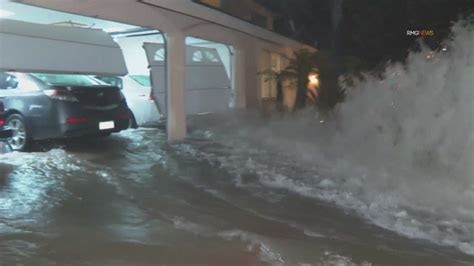 Water main break damages garage door, floods Northridge street