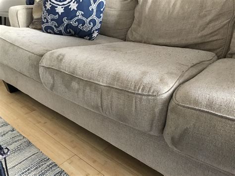 Water stain on couch. Dampen a microfiber cloth with warm water. Gently scrub in a circular motion to remove dirt or dust. Pro tip: Wool couches are generally labeled with a “W,” with the label specifying whether ... 