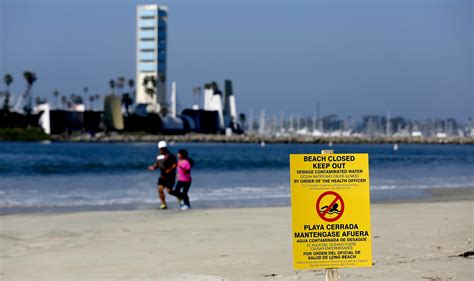 Waters at Orange County beach closed after massive sewage spill