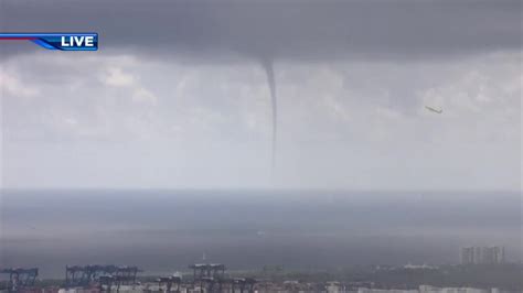 Waterspout dissipates after making landfall on Hollywood Beach