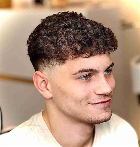 Wavy Hair Low Taper, The fohawk taper is one of the most popular haircut  styles for guys.