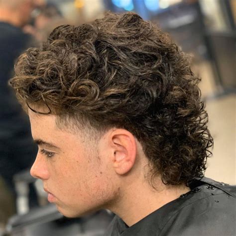 Mar 7, 2024 · Punk Inspired Curly Mullet. Embrace an edgy aesthetic with sharply defined sides accentuating voluminous curls on top and at the back. Contrast is key as the structured undercut highlights the rebellious curls cascading down. Accessorize with bold jewelry or piercings to punctuate this punk-inspired take on the modern mullet. 2 of 16.