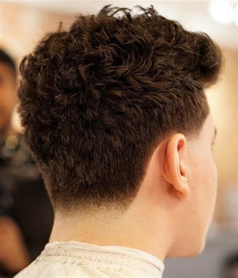 Wavy taper haircut. Getting a haircut can be a daunting task, especially if you’re unsure of what style you want. If you’re a man looking to switch up your hairstyle or simply maintain your current on... 
