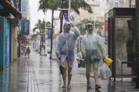 Weakened Tropical Storm Mawar brings heavy rains to Japan’s southern islands as it passes by